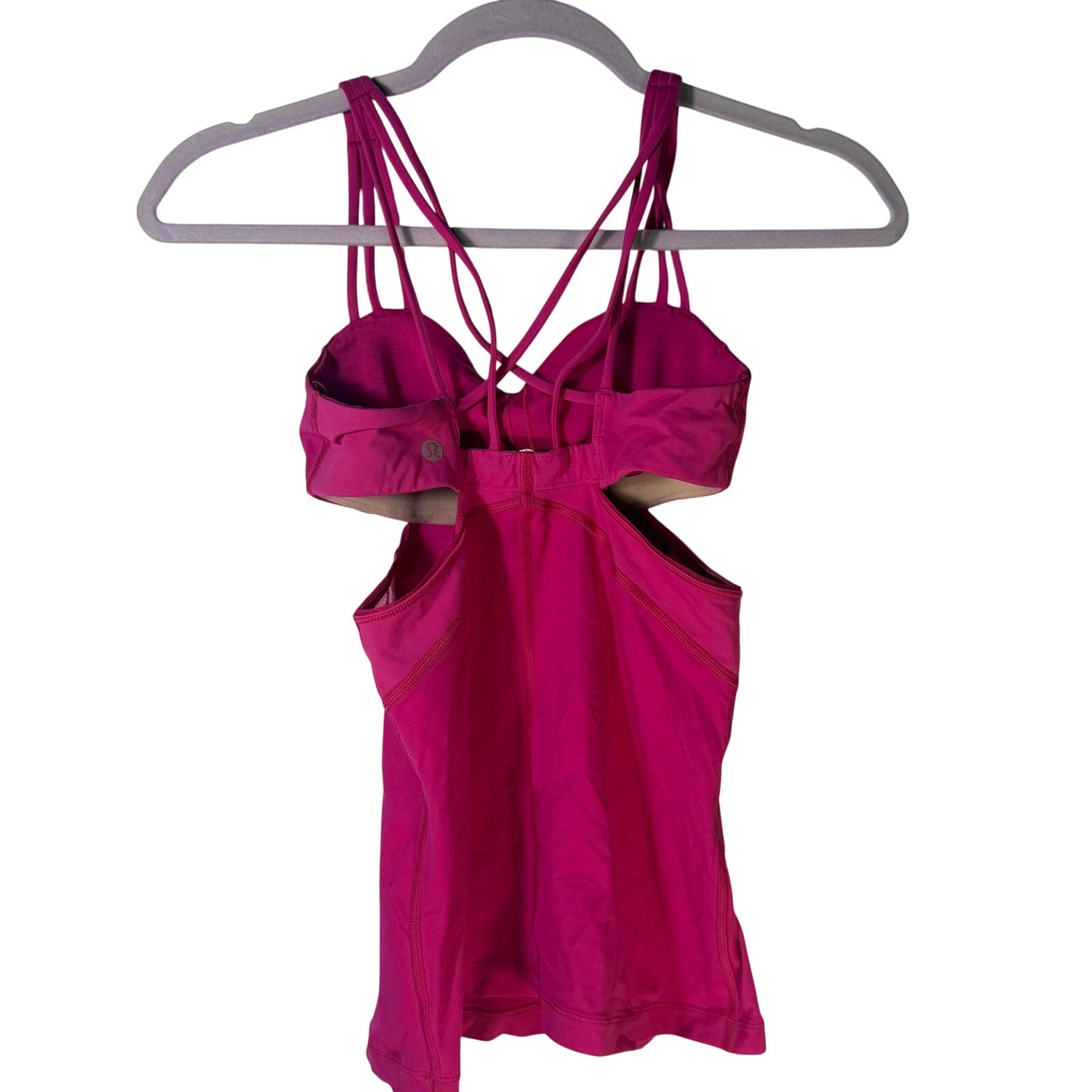 Lululemon women’s magenta strappy cutout athletic tank top, size 2, pre-owned, with crisscross straps and sleeveless design