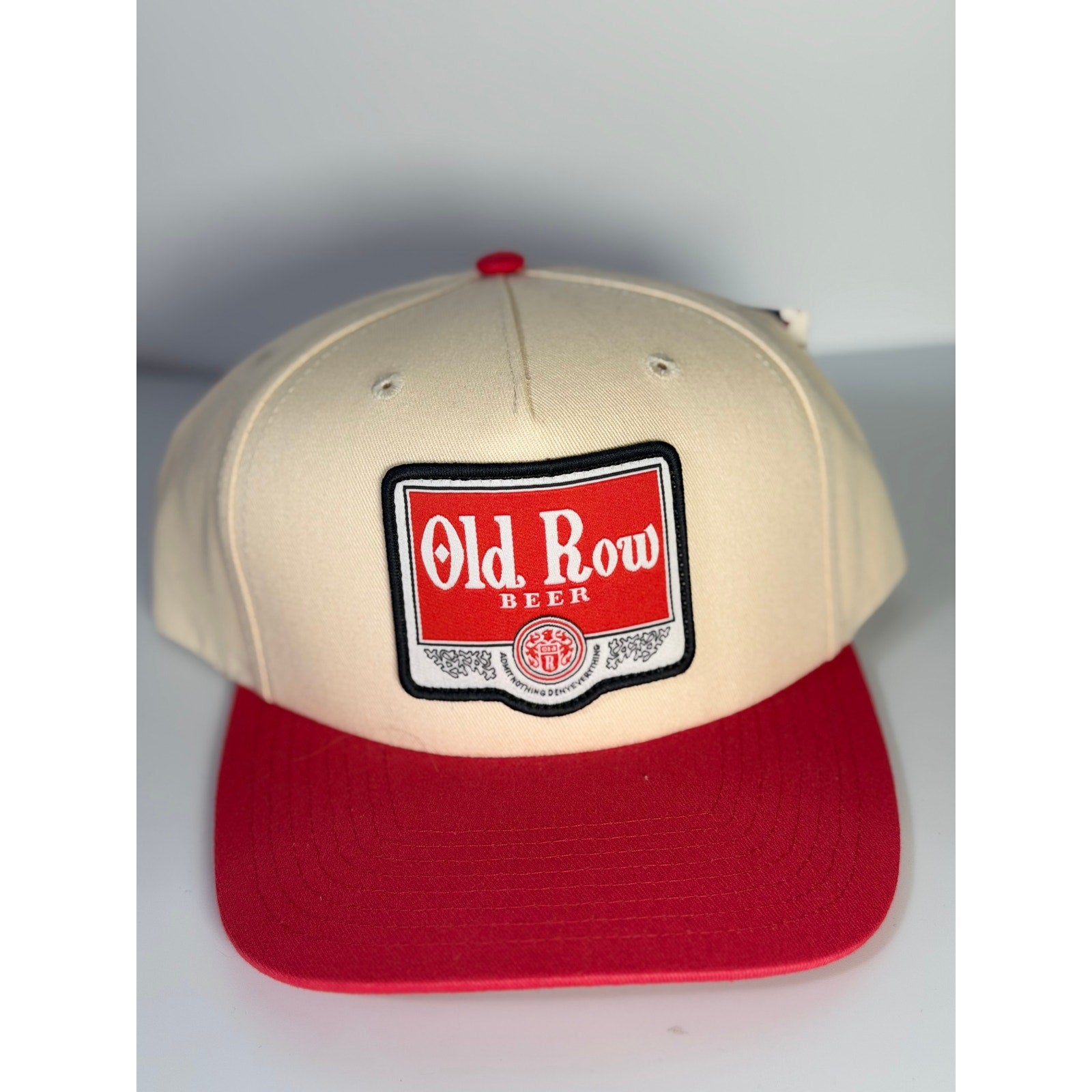 Old Row Beer snapback hat in red and cream, adult-sized baseball cap with embroidered logo, new with tags.