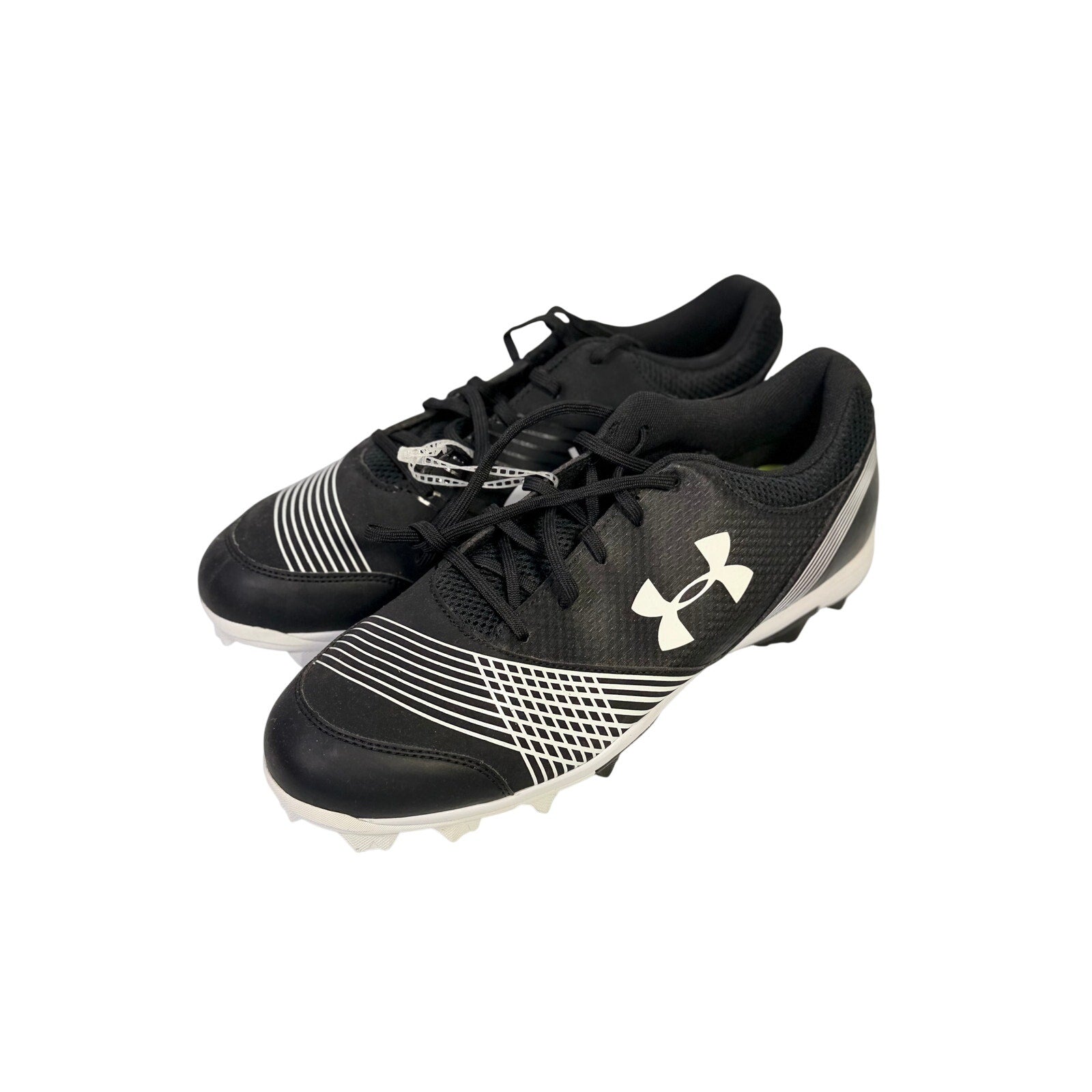 Under Armour men's black and white baseball cleats with molded soles, size 12, athletic shoes designed for baseball gameplay.
