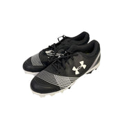 Under Armour men's black and white baseball cleats with molded soles, size 12, athletic shoes designed for baseball gameplay.