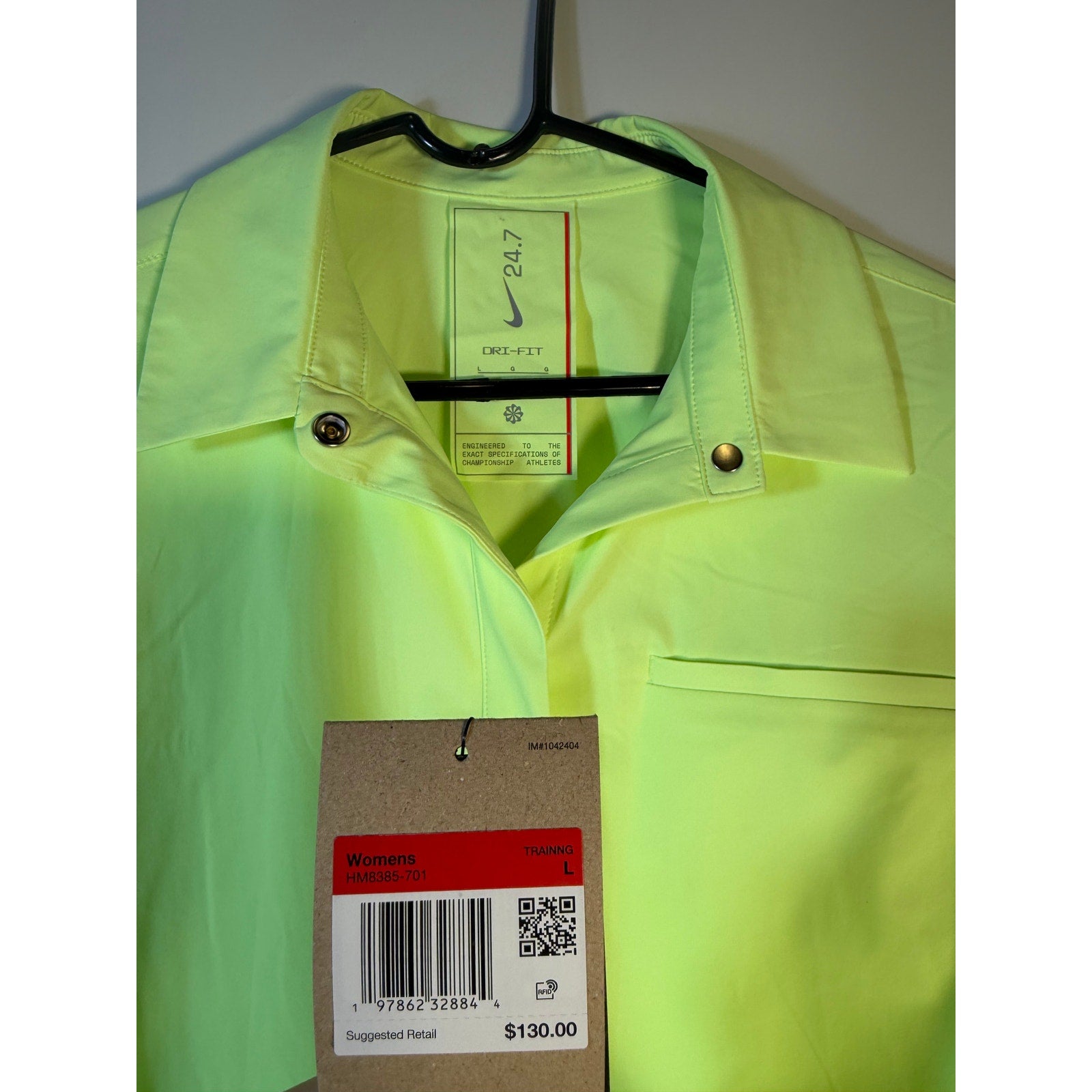 Nike 24.7 Dri-FIT women's training shirt dress in volt green, size large, with Nike logo, lightweight and athletic fit.
