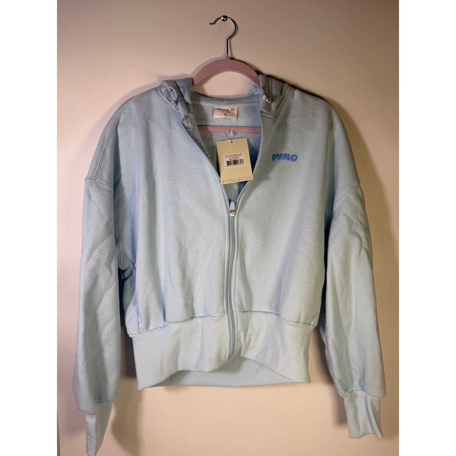 Wilo The Label blue women's wellness club crop zip hoodie, size M, featuring a front zipper and casual fit.