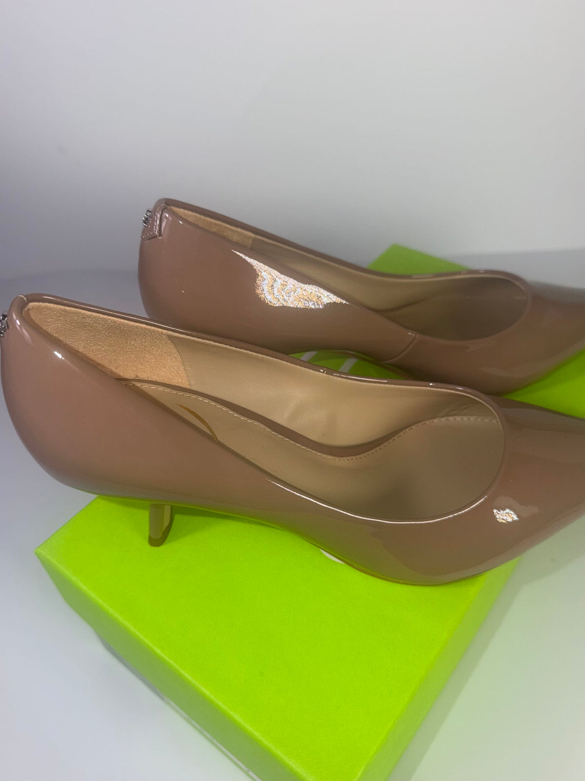 Sam Edelman Bianka patent kitten heel pumps in taupe, size US 7, featuring a sleek pointed toe and glossy finish.