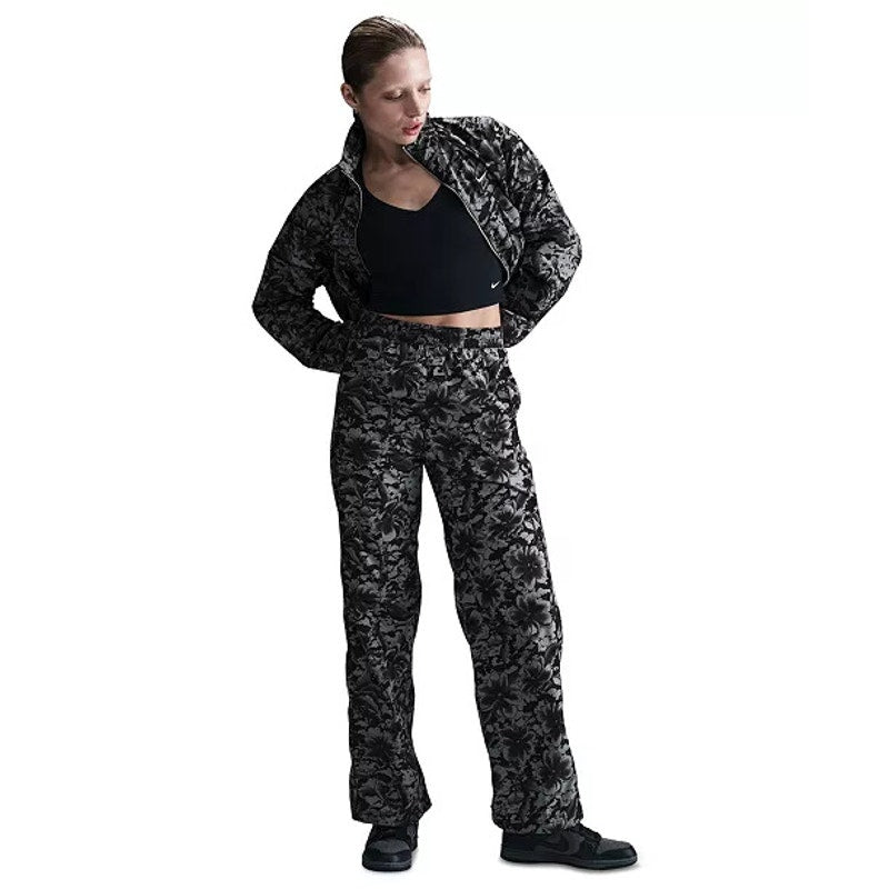 Nike Women's Floral Wide Leg Track Pants in black and gray, showcasing the floral pattern and relaxed fit, size XS.