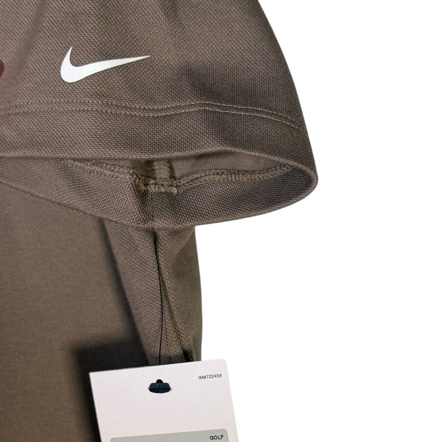 Nike women's short-sleeve golf polo in mink brown, size XS, displayed flat with collar and buttons.