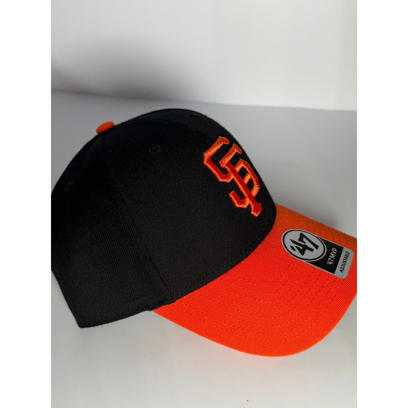 '47 Brand San Francisco Giants black and orange MVP adjustable MLB baseball hat featuring team logo and structured design.