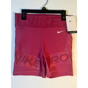 Nike Pro women's high-rise training shorts in berry color, XL size, featuring firm support and athletic fit.
