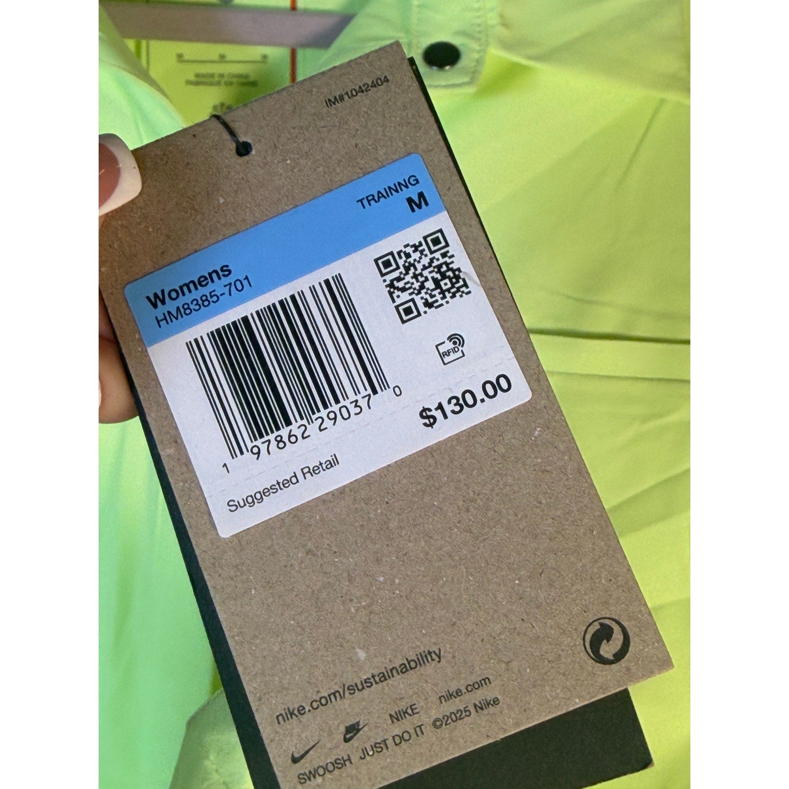 Nike 24.7 Dri-FIT women's long sleeve training shirt in neon yellow, lightweight and breathable for workout comfort.