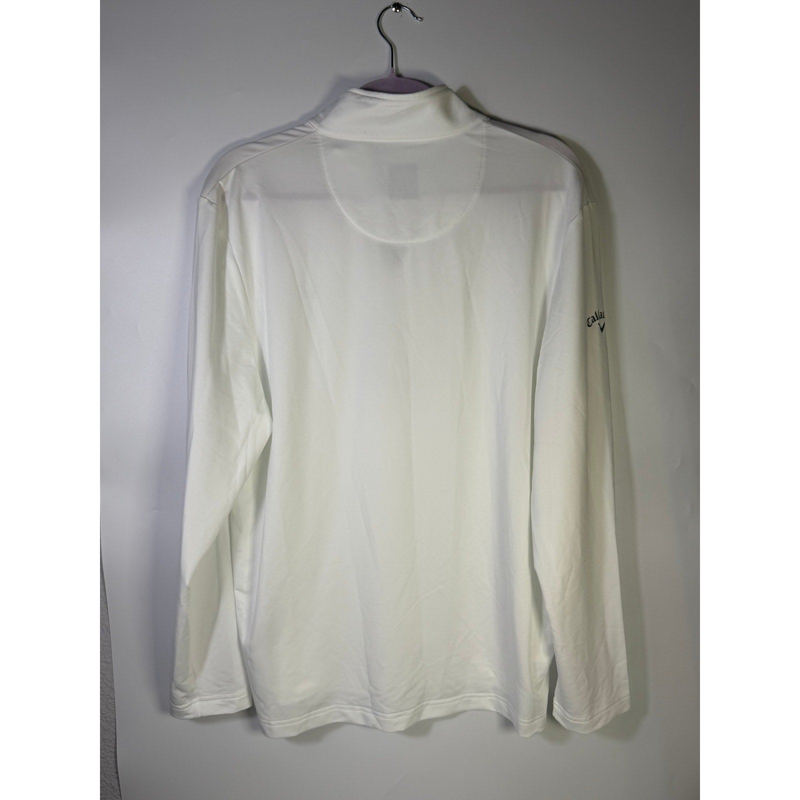 Callaway women's white Opti-Dri quarter zip golf sweatshirt, size large, showcasing the lightweight, moisture-wicking fabric and athletic fit.