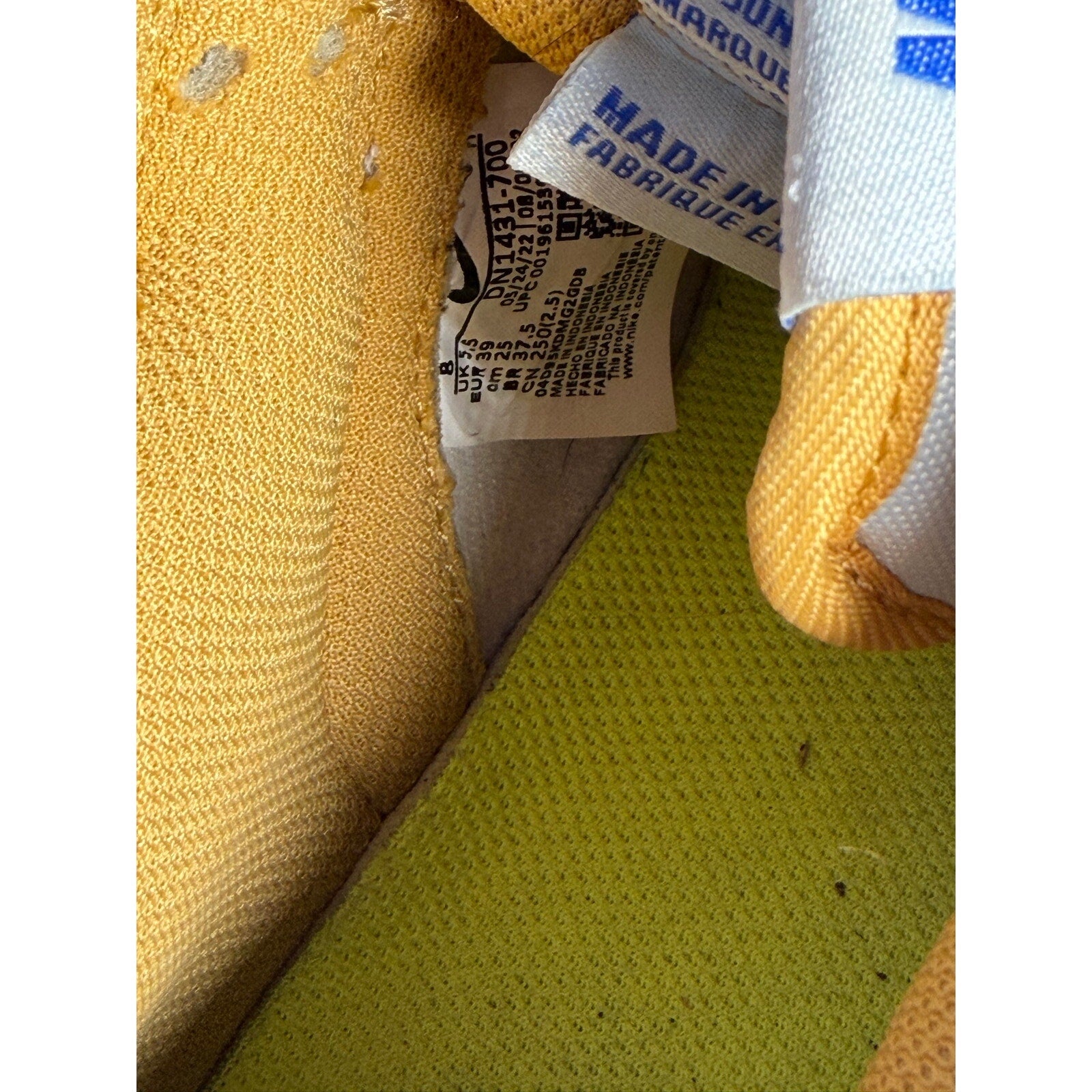 Nike Dunk Low GS sneakers in university gold, game royal, and white leather for youth, US size 6Y, athletic sneaker style.