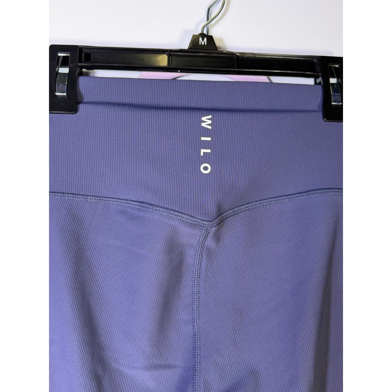 Wilo The Label women’s navy 2-piece sweatshirt and leggings set, size S, featuring comfortable stretch fabric, front view.