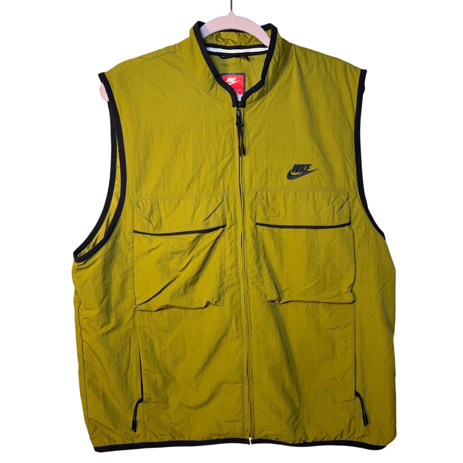Nike Tech Woven Utility Wind Vest for men in green, full zip, lightweight windproof vest with multiple utility pockets.