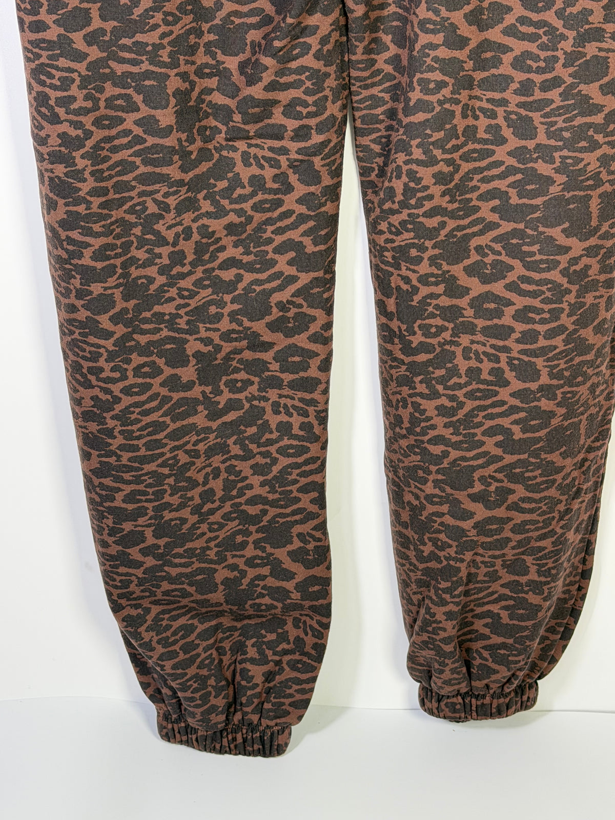 Joe's Sierra animal print jogger pants in brown, size M, featuring a stylish jogger design with animal print fabric.