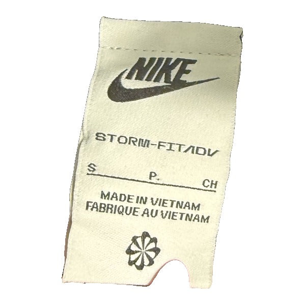 Black Nike Storm-FIT ADV long trench coat for women, small size, showing the sleek, waterproof design and classic fit.
