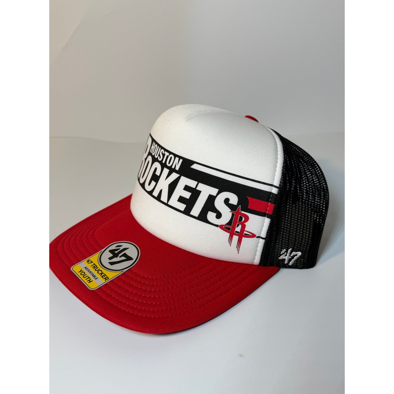 Red and black 47 Brand Houston Rockets youth trucker snapback hat with adjustable strap, new with tags.