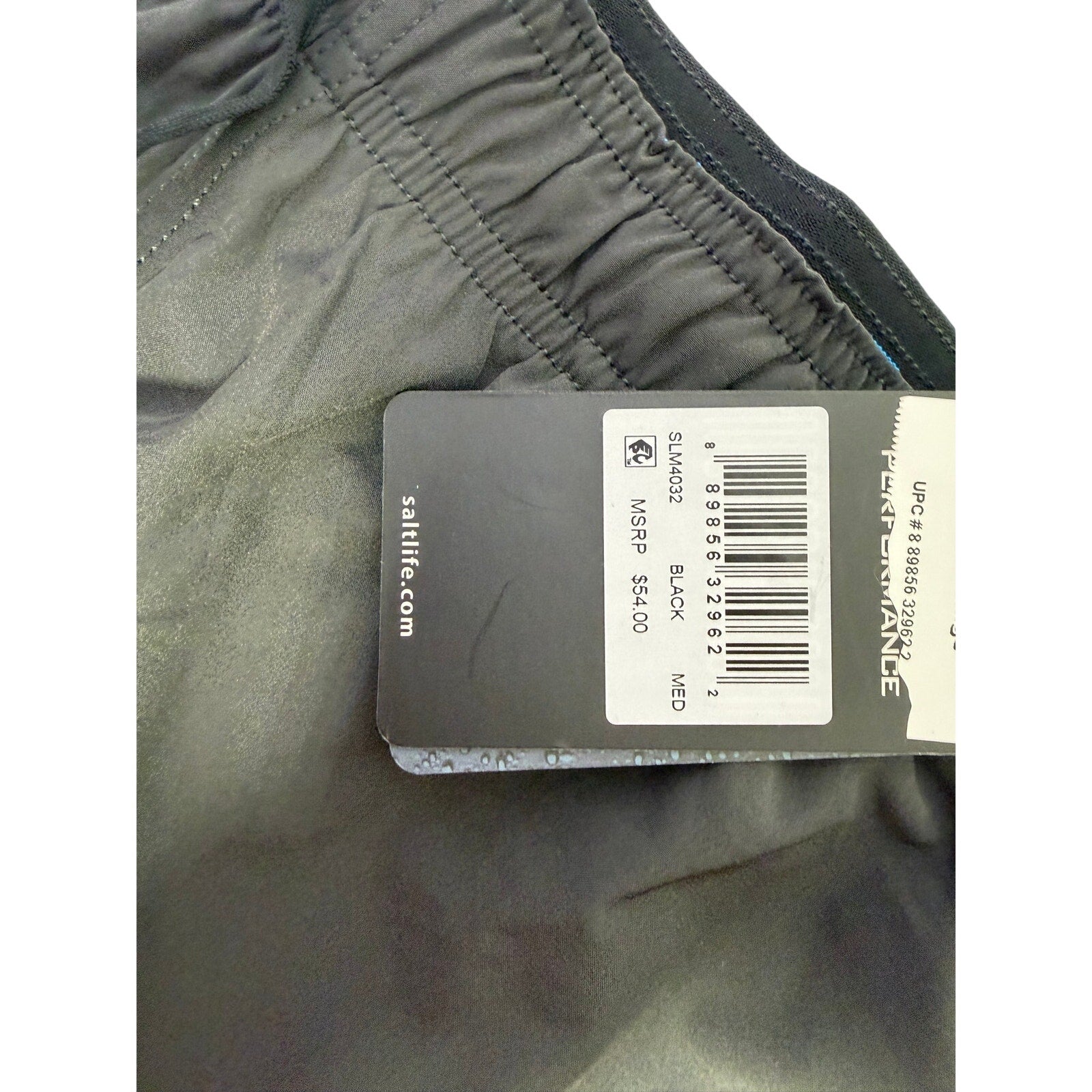 Salt Life men's black Breaker Performance Hybrid Shorts, medium size, shown flat with waistband and quick-dry fabric.