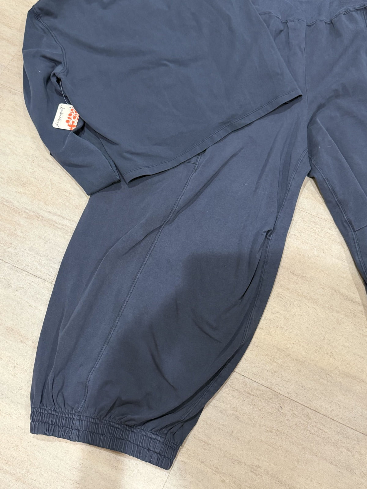 FP Movement women's midnight navy 2-piece set with mock neck top and jogger pants, size XL, new with tags.