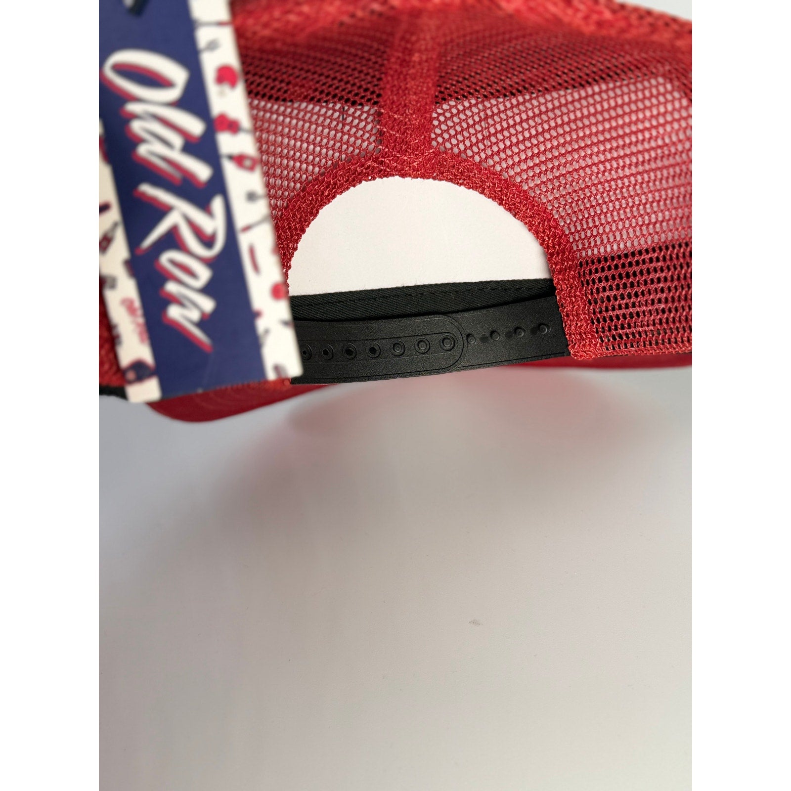 Old Row logo rope trucker hat in red with snapback closure, adult one size baseball cap featuring a casual style and adjustable fit.