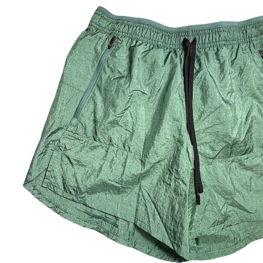 Nike Running Division Stride 5" Dri-FIT men's shorts, small size, lightweight athletic shorts with Nike branding and breathable fabric.