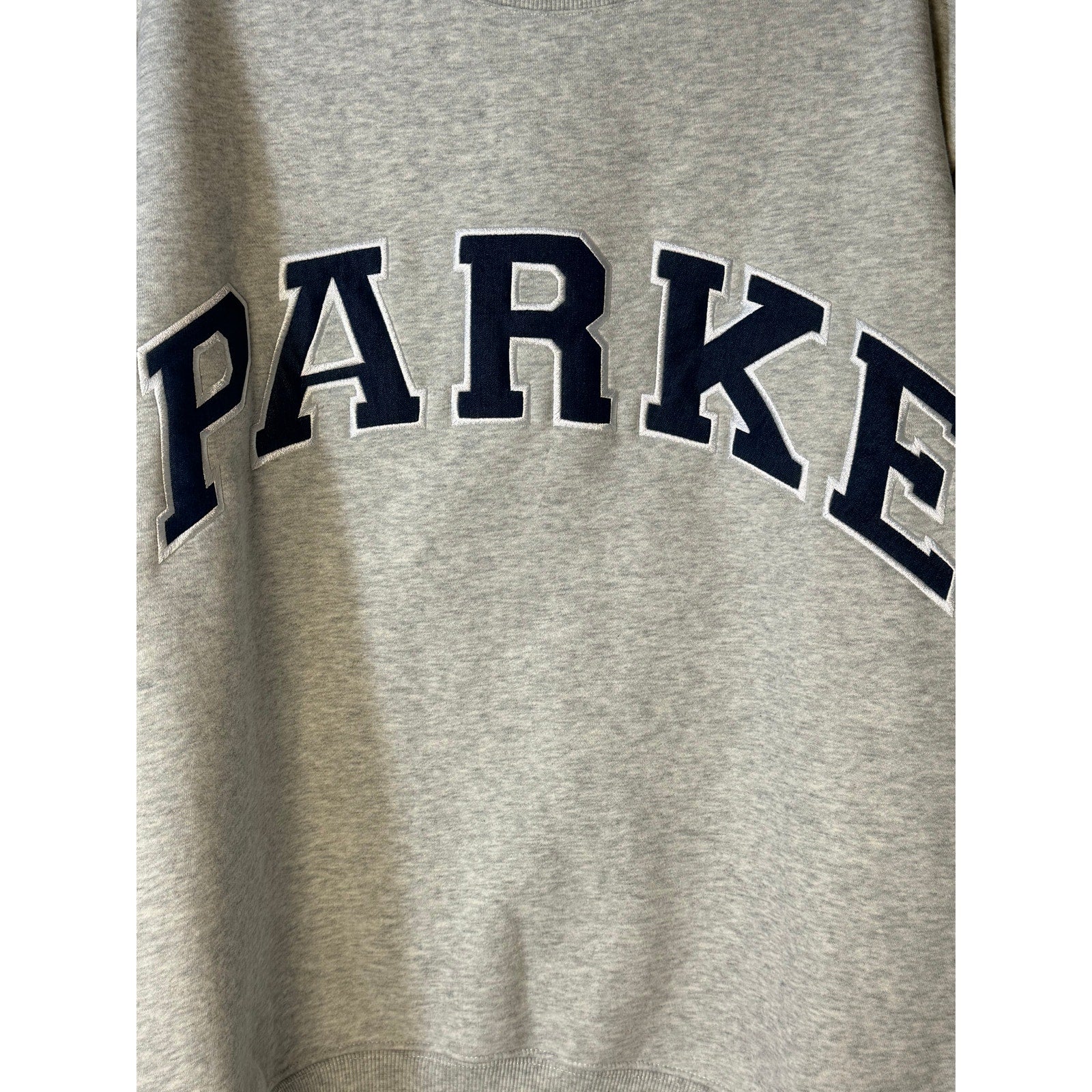 Women's gray PARKE mock neck sweatshirt with embroidered logo, oversized fleece pullover with long sleeves and relaxed fit.