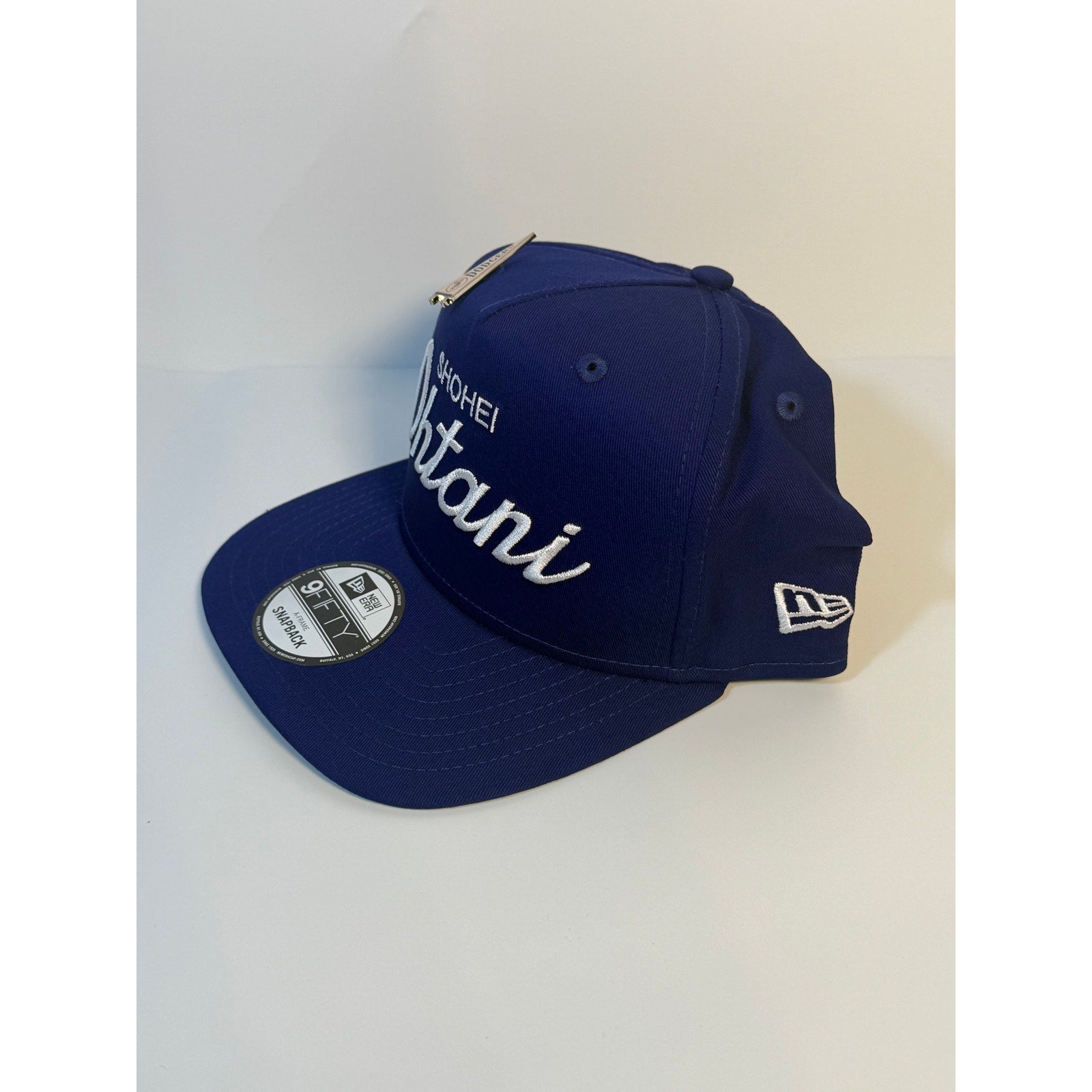 New Era 9FIFTY Shohei Ohtani Los Angeles Dodgers blue snapback hat with A-frame design, front logo and adjustable strap.