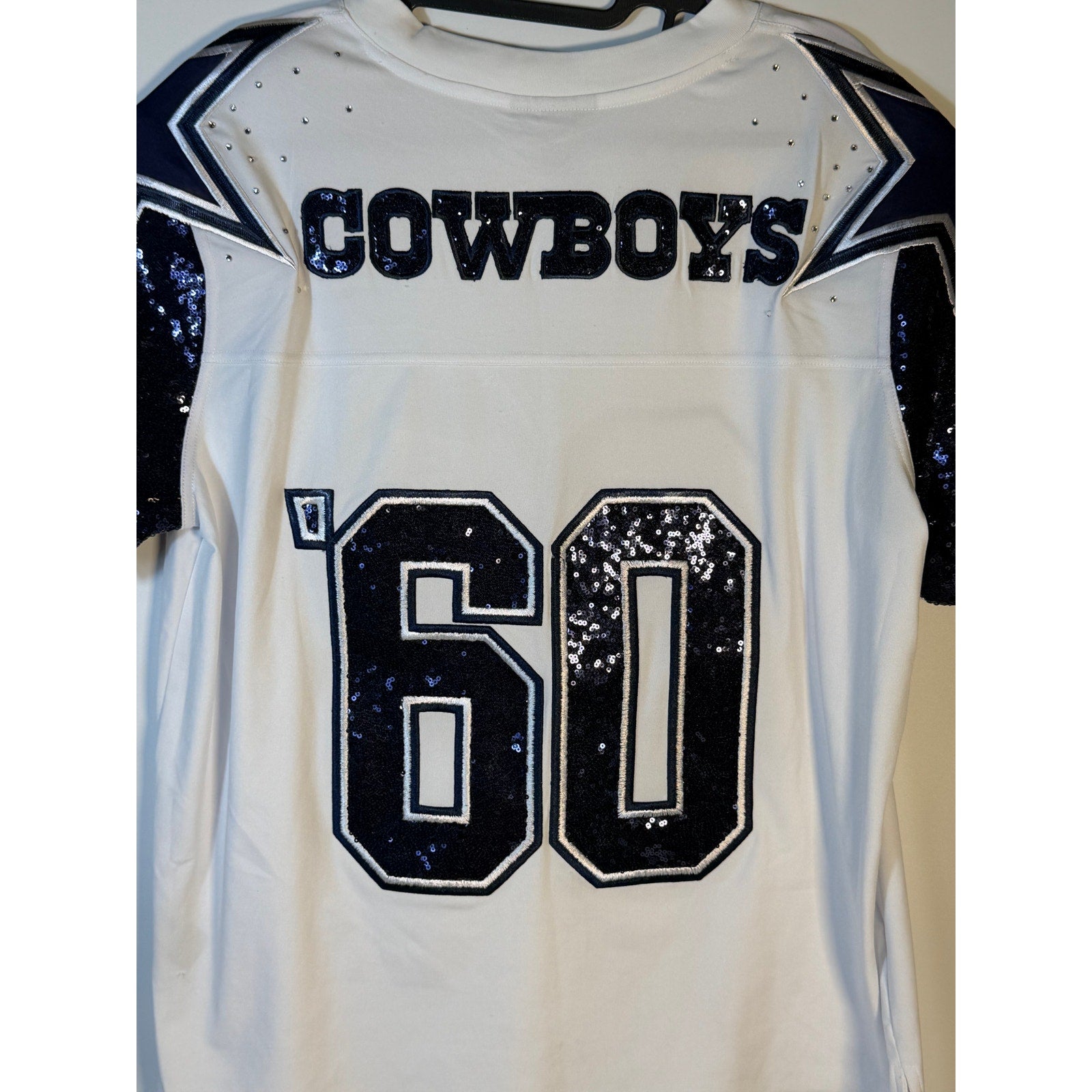 White Dallas Cowboys sequin jersey for women by Wear by Erin Andrews, large size, shown with NFL branding and shiny sequin details.