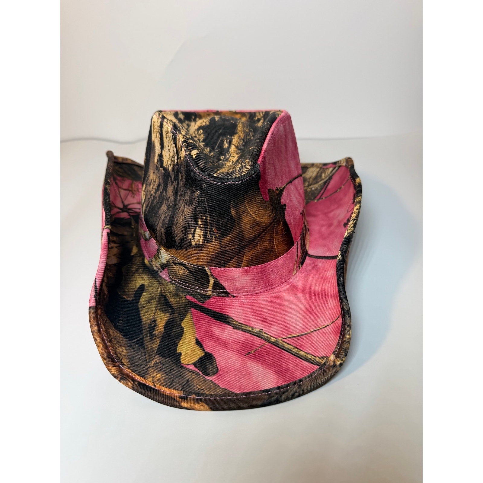 Peter Grimm women's pink camo western cowboy hat with snap-up brim and Mossy Oak pattern, stylish and functional accessory.