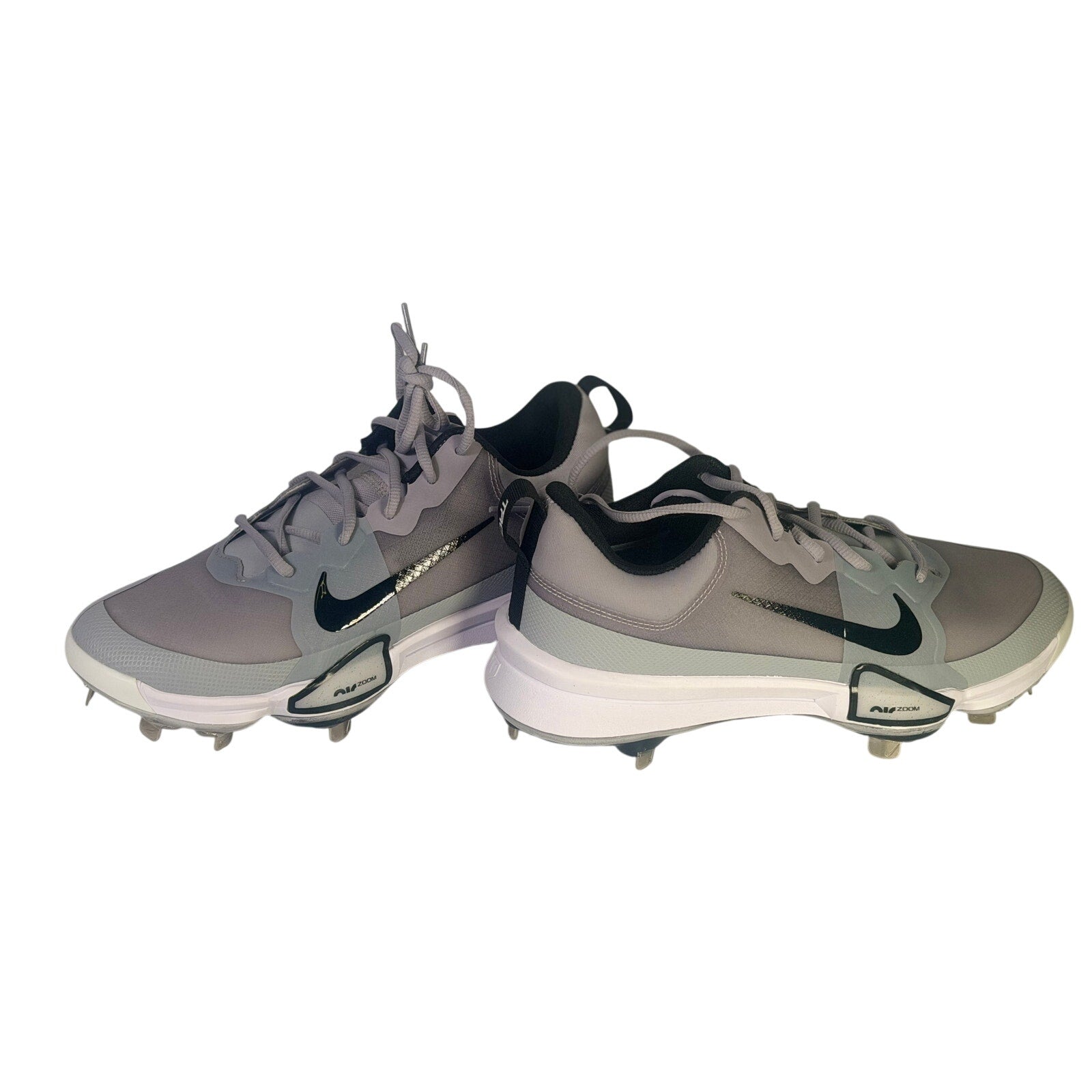 Nike Force Zoom Trout 9 Pro men's baseball cleats in grey, athletic shoes with Nike branding and cleat spikes for baseball.