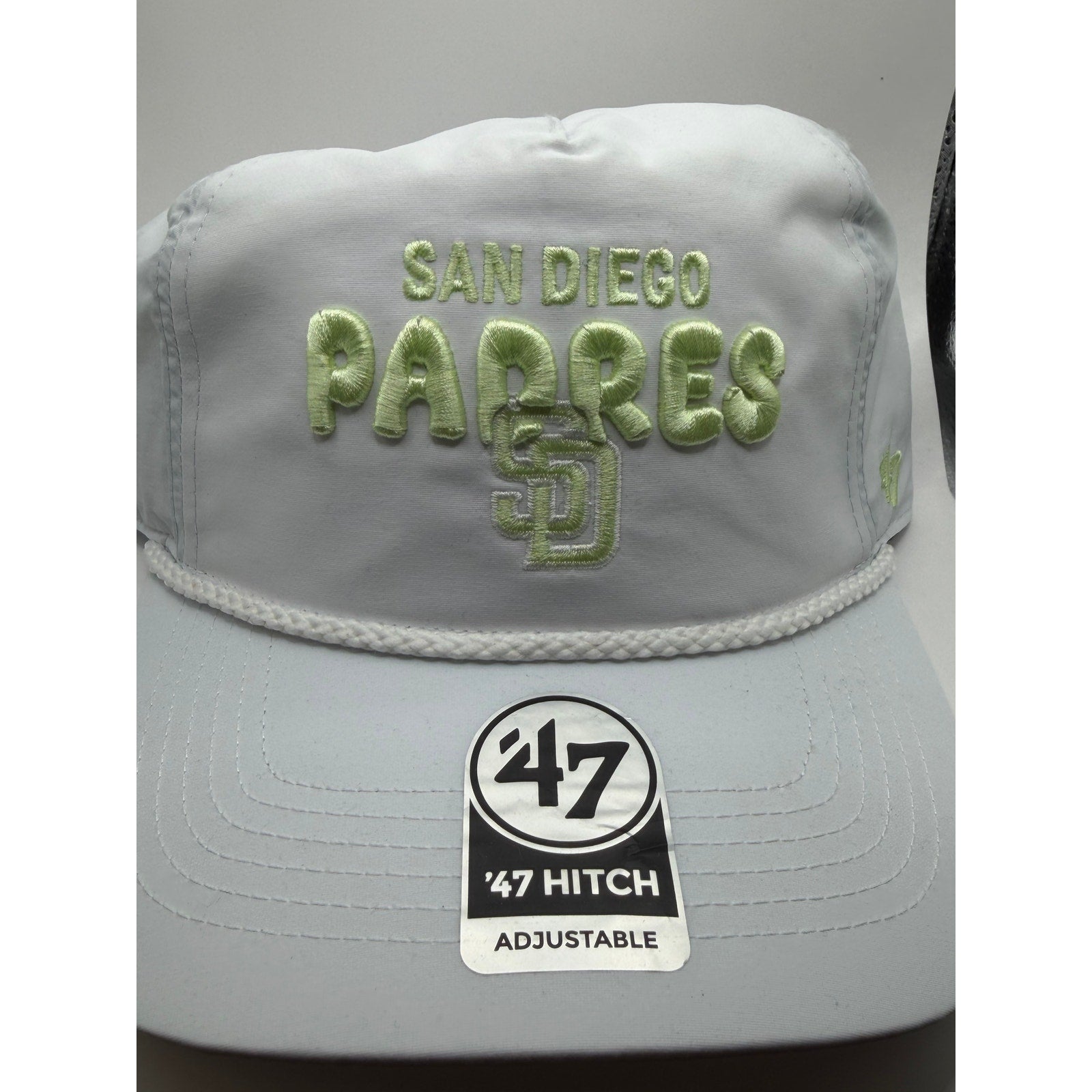 Gray and green San Diego Padres MLB ’47 Hitch adjustable snapback hat with logo, new with tags, front view.
