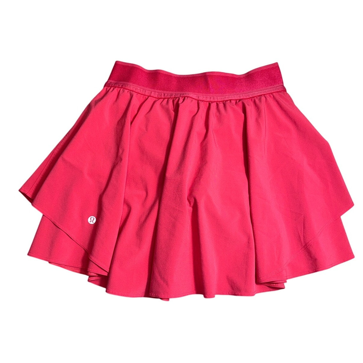 Lululemon Sonic Pink Ruffle Skort for women, size 6, showing the pink ruffle detail and athletic fit in great condition.