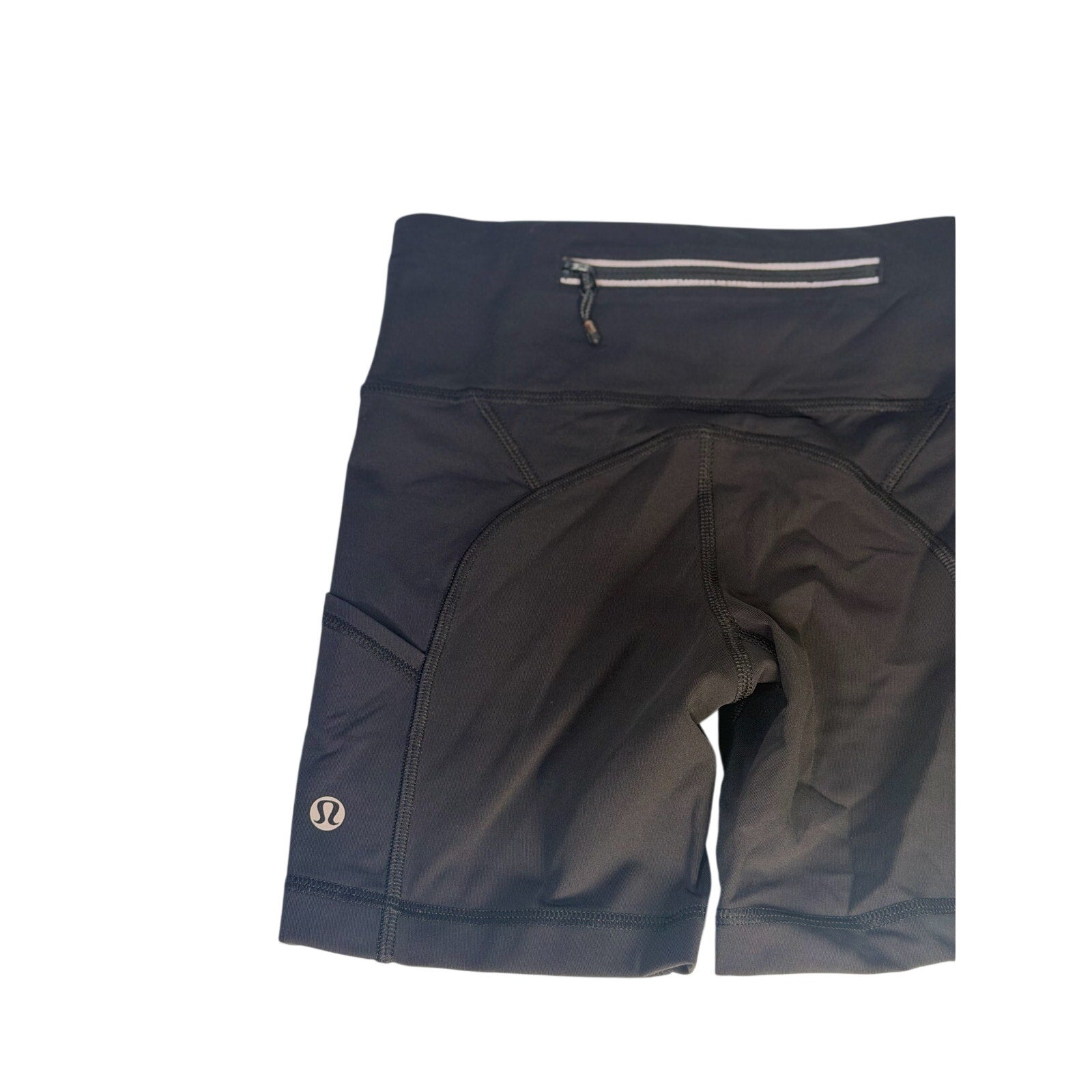 Lululemon women's black high-rise biker shorts with pockets, size 2, made of stretchy athletic fabric for active wear.