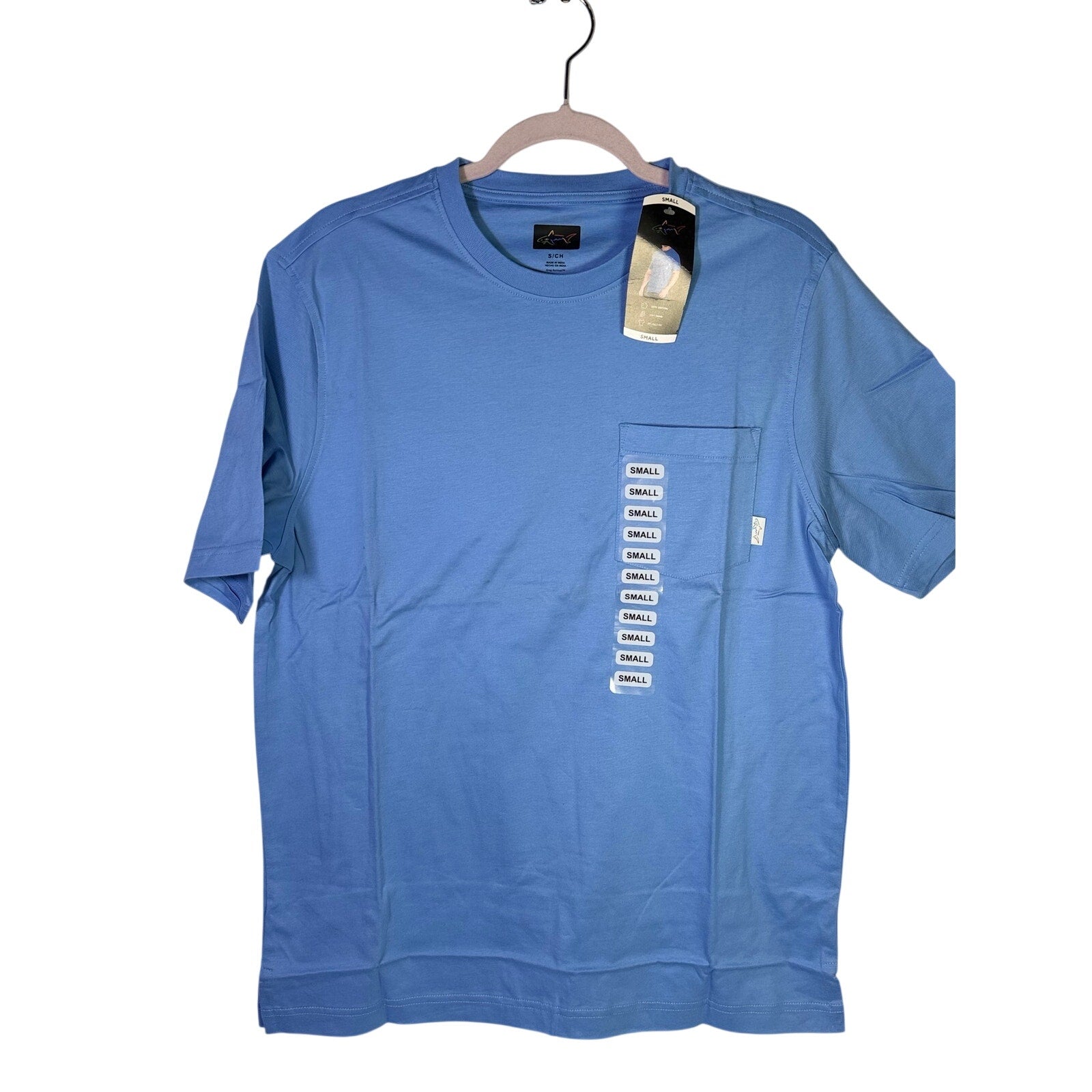 Greg Norman men's blue pocket T-shirt, relaxed fit, size small, casual style with front pocket and short sleeves.