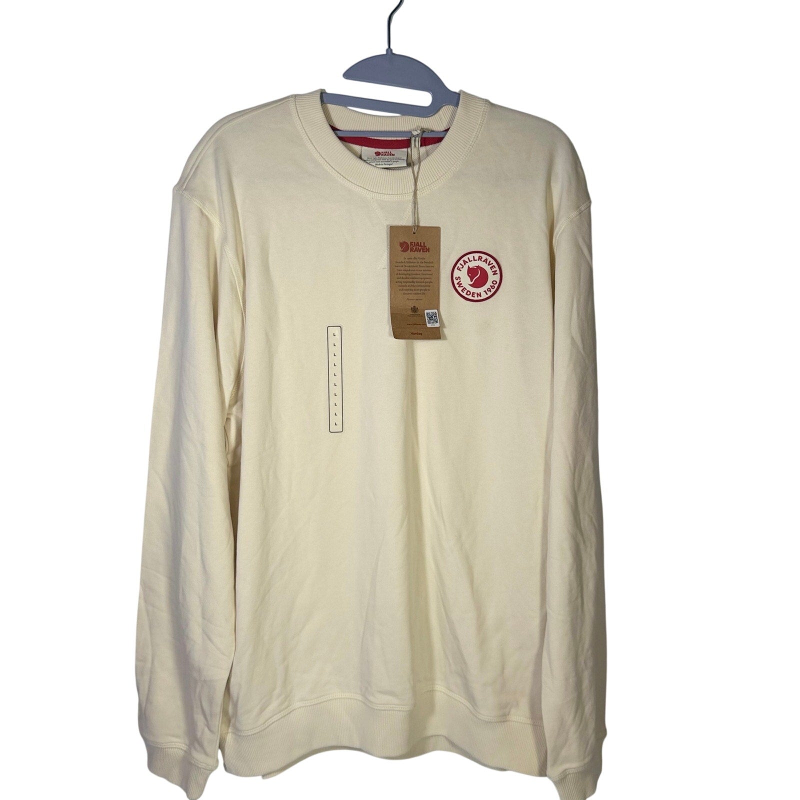 Fjällräven Vardag crewneck sweatshirt in cream red with logo, size large, showing the soft fabric and classic fit.