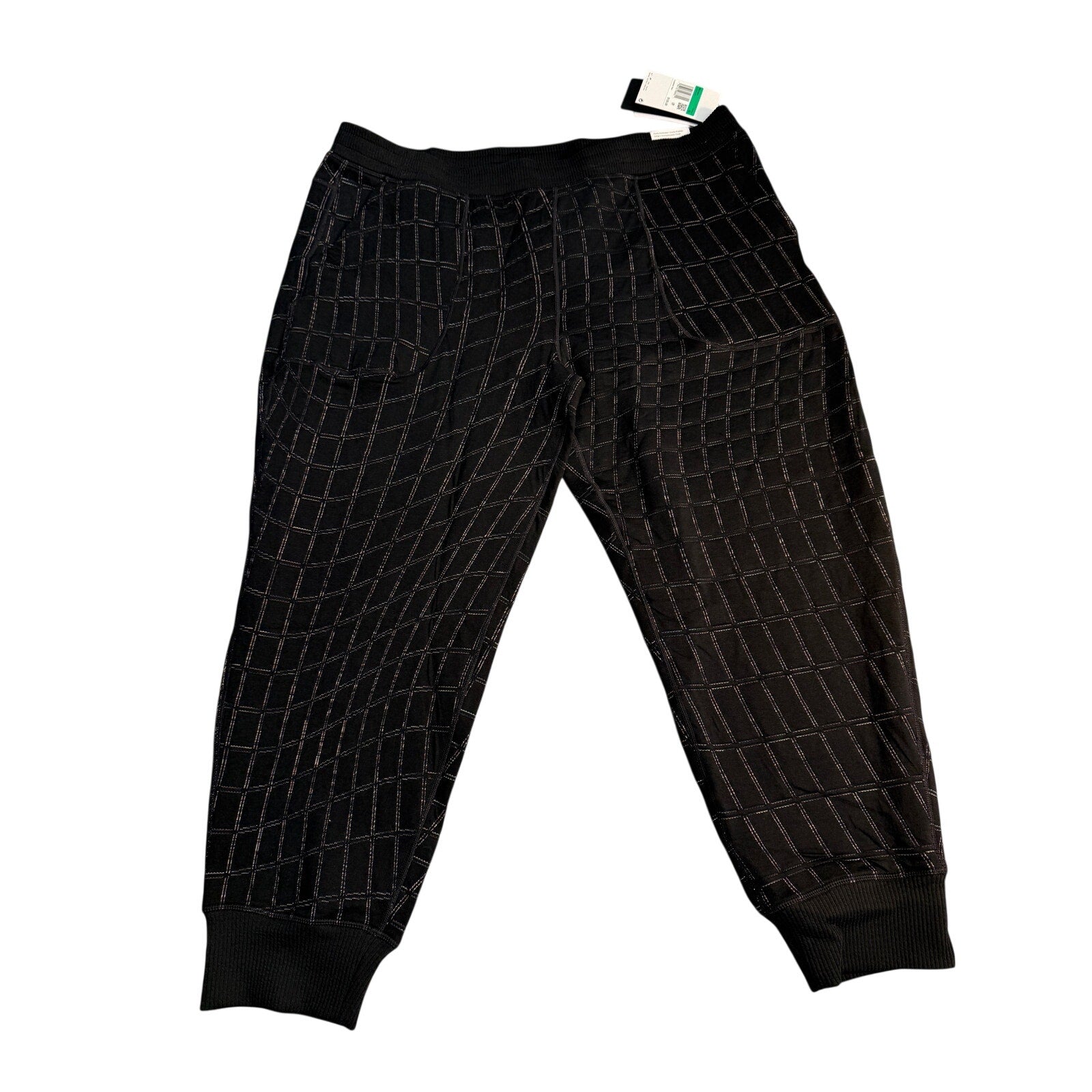 Black Nike Yoga Luxe Dri-FIT Grid jogger pants for women, size XL, featuring comfortable athletic design and tapered fit.