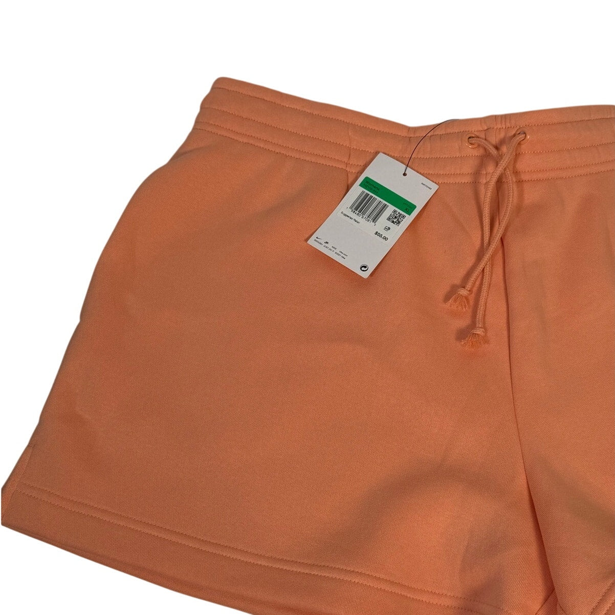 Nike women's peach orange fleece drawstring shorts with side pockets, size XL, comfortable and casual athletic wear.