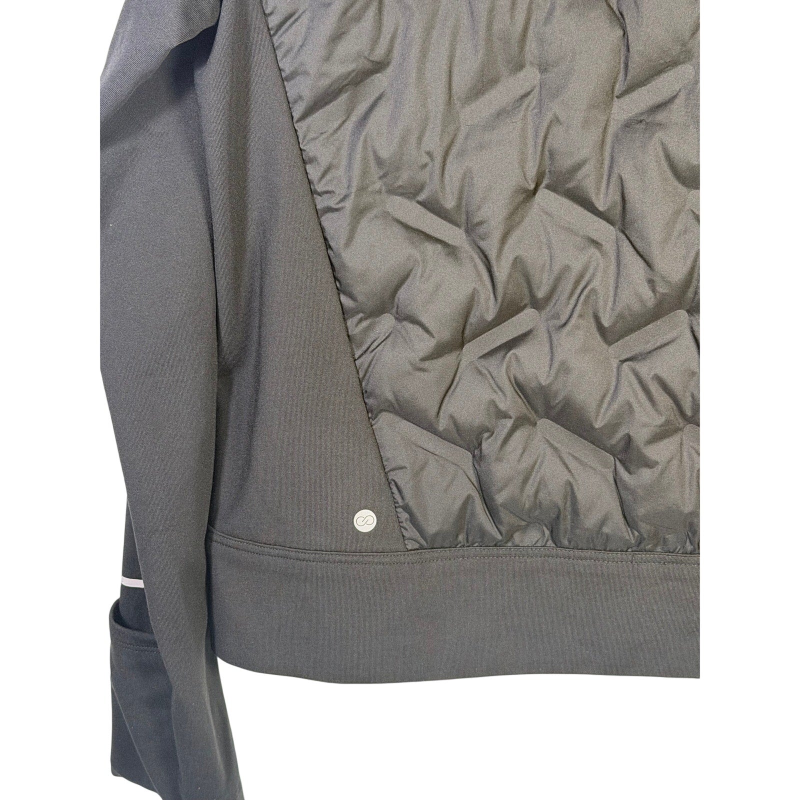 CALIA women's Cold Dash Run Jacket in pure black, size medium, featuring quilted design and hybrid insulation.