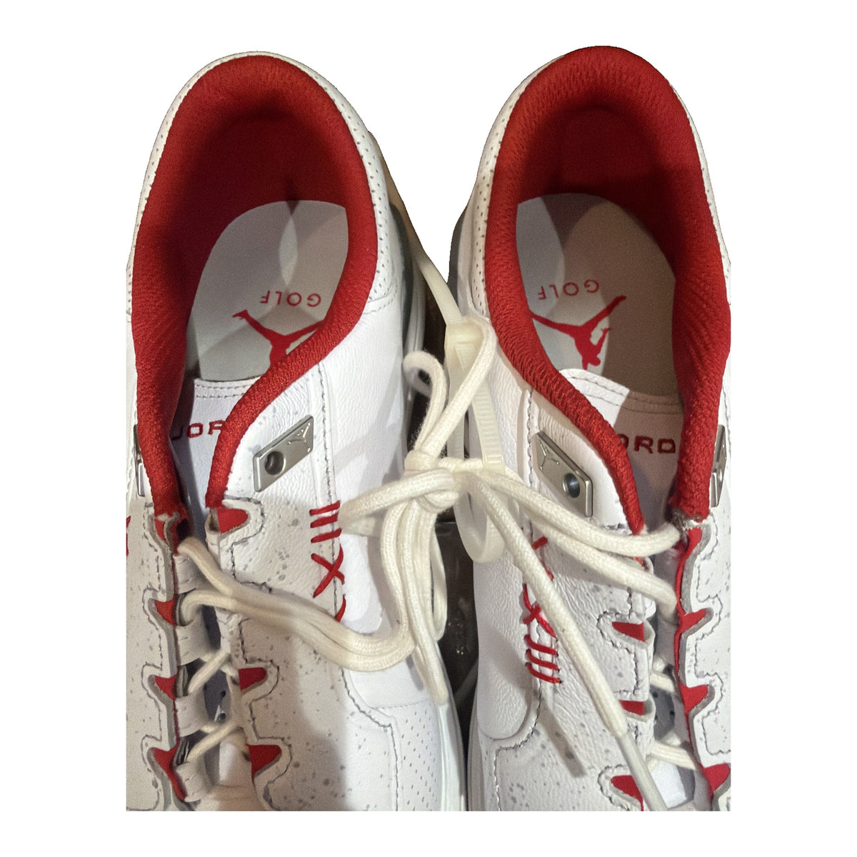 Men's Nike Jordan ADG 4 golf shoes in white and gym red, size 11, new without box, featuring a sporty design and athletic sole.