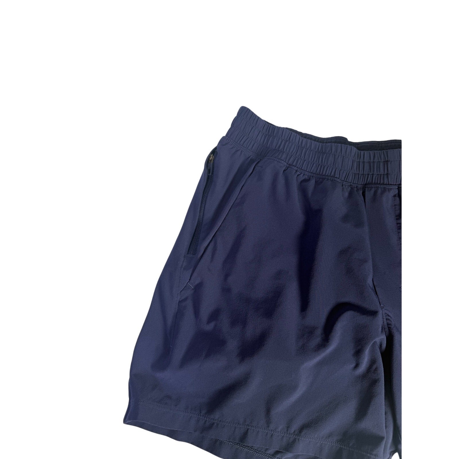 Lululemon men's navy blue athletic running shorts, size M, with lightweight fabric and elastic waistband, designed for active wear.