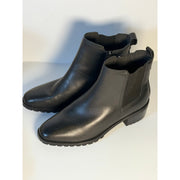 Easy Spirit women's black Chelsea ankle boots with side zip, size 8.5M, pre-owned, featuring sleek leather and low heel.