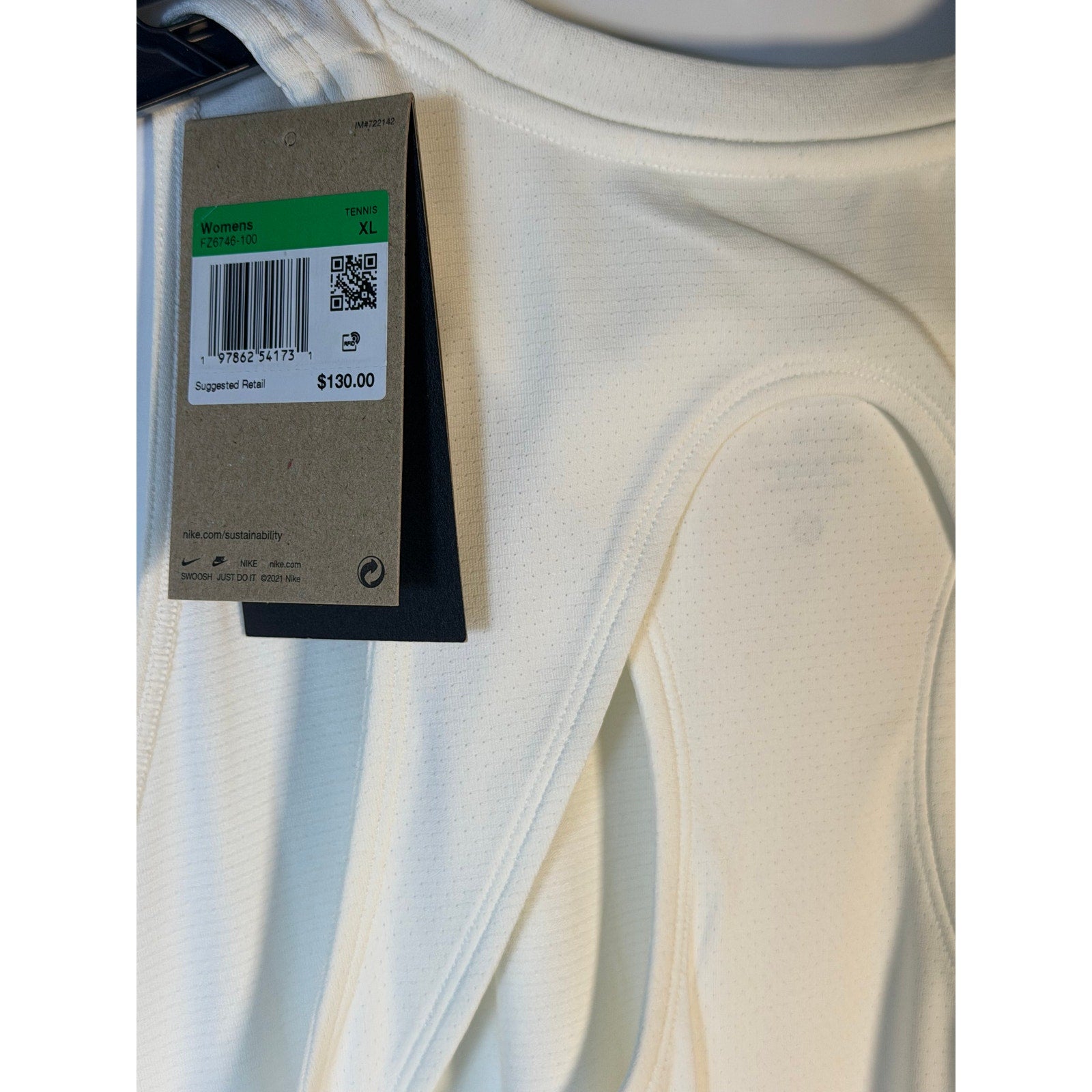 NikeCourt Dri-FIT tennis dress for women, sleeveless white athletic dress in size XL, designed for comfort and performance.