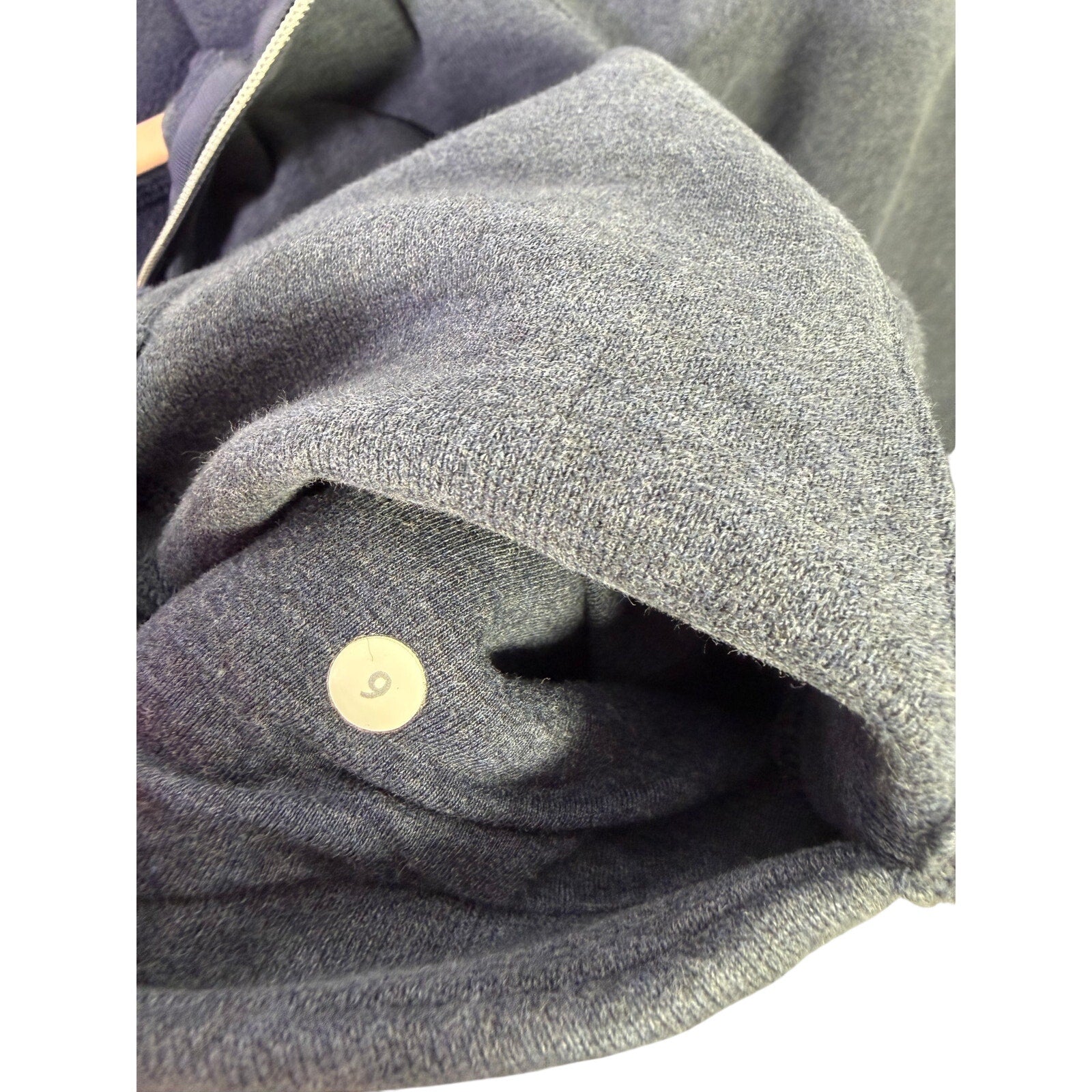 Lululemon women's Heathered Blue Scuba Full-Zip Hoodie, size 6, showcasing the soft, comfortable sweatshirt with full zipper and hood.