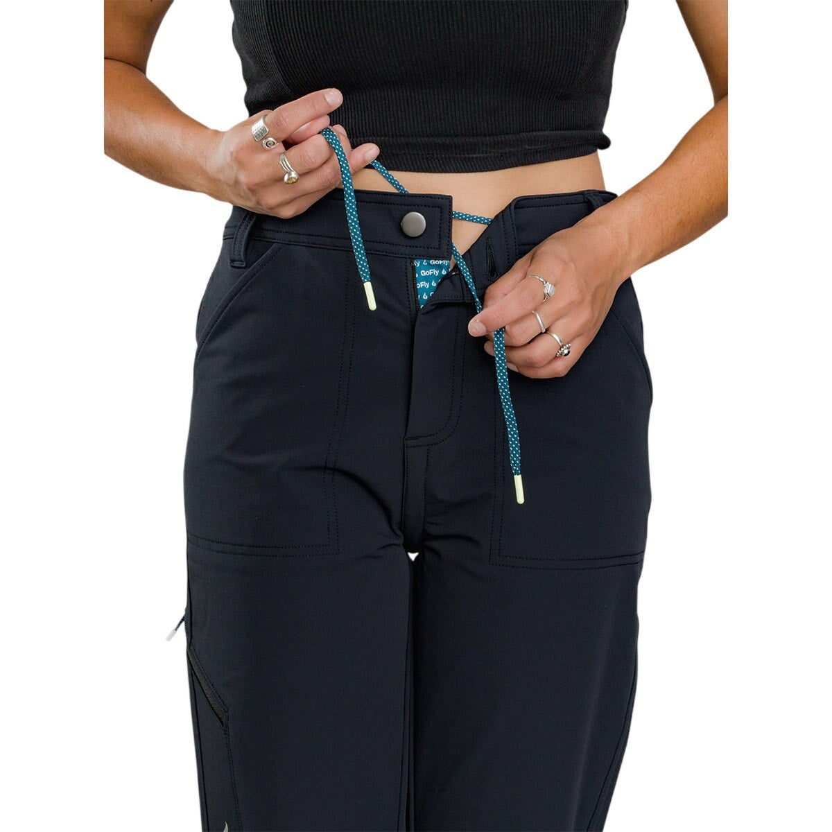 Black Gnara Go There pants for women, size 00, featuring GoFly® zipper details, shown laid flat on a white background.