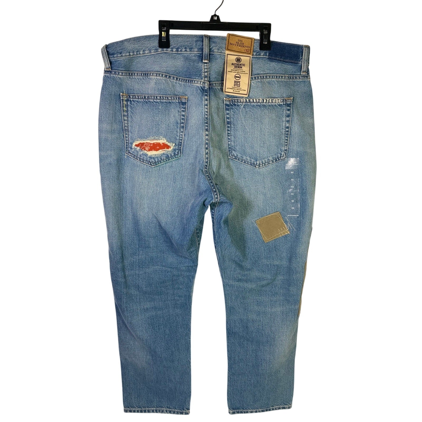 Polo Ralph Lauren men's slim boyfriend patchwork distressed jeans in size 32, showing faded denim and patch accents.