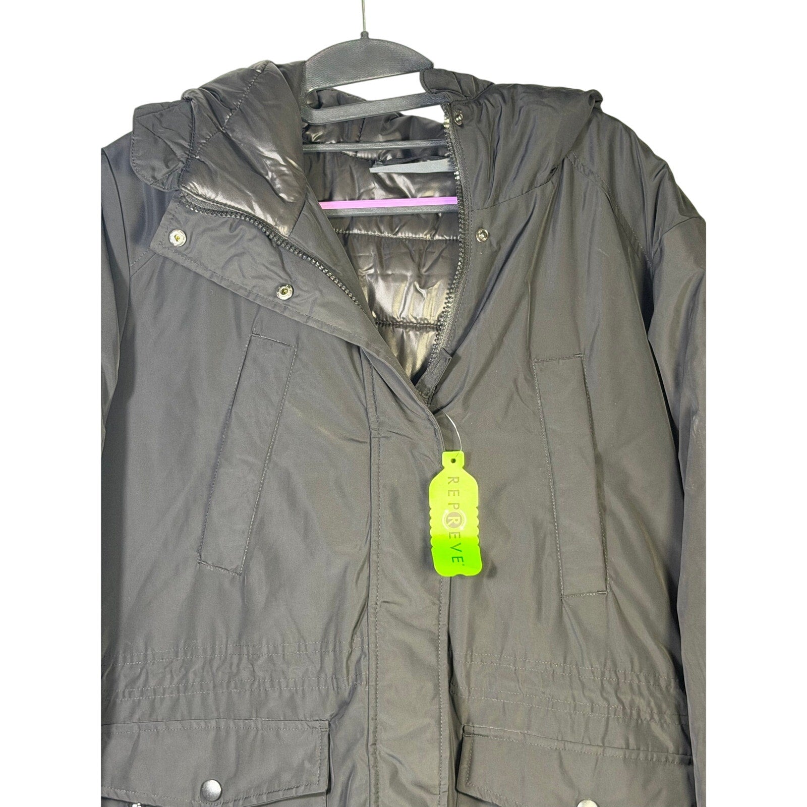 Black Free Country Women’s Arctic Series Anorak Jacket with hood, long coat style, featuring a sleek, insulated design for cold weather.