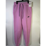 Nike Sportswear Phoenix fleece jogger sweatpants for women, pink mid-rise with an XS size, soft and comfortable fabric.