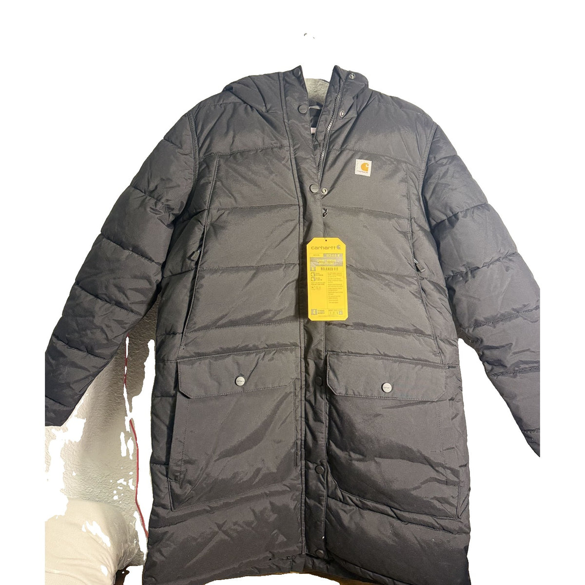 Black Carhartt Montana Relaxed Fit Insulated Parka with faux fur hood, women's medium jacket, warm and stylish outdoor wear.