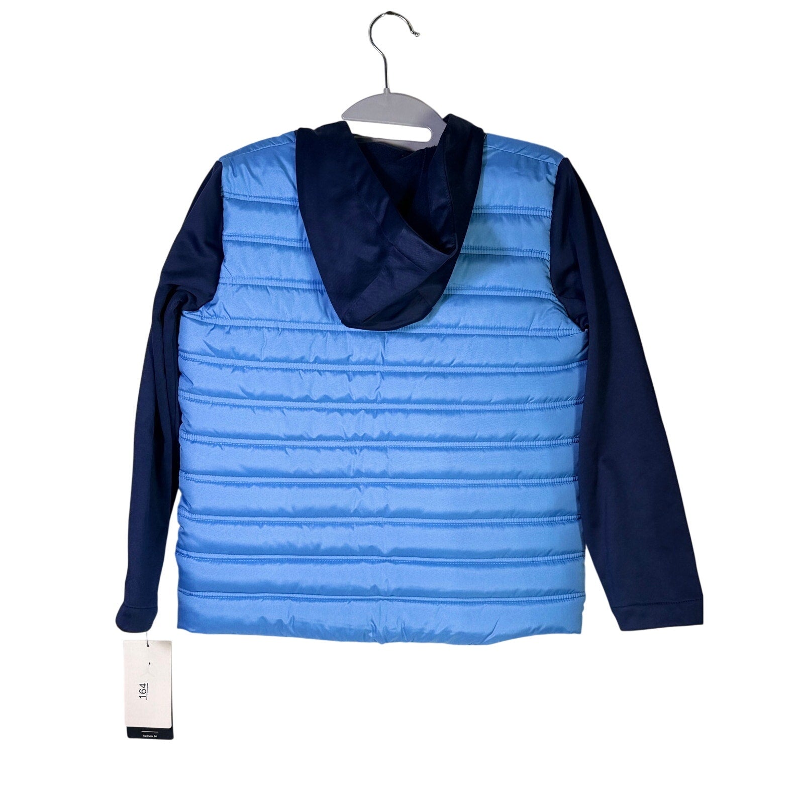 Jordan Boys Legend Blue Hybrid Puffer Jacket in size small, new with tags, featuring a blue color and quilted puffer design.