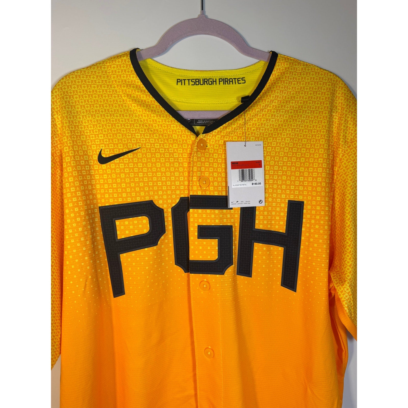 Nike Pittsburgh Pirates City Connect MLB jersey for men in large size, featuring team logo and gold design details.