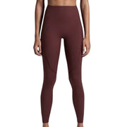 On Cloud women's Movement tights in mulberry color, XS long leggings, featuring sleek fabric and comfortable fit.