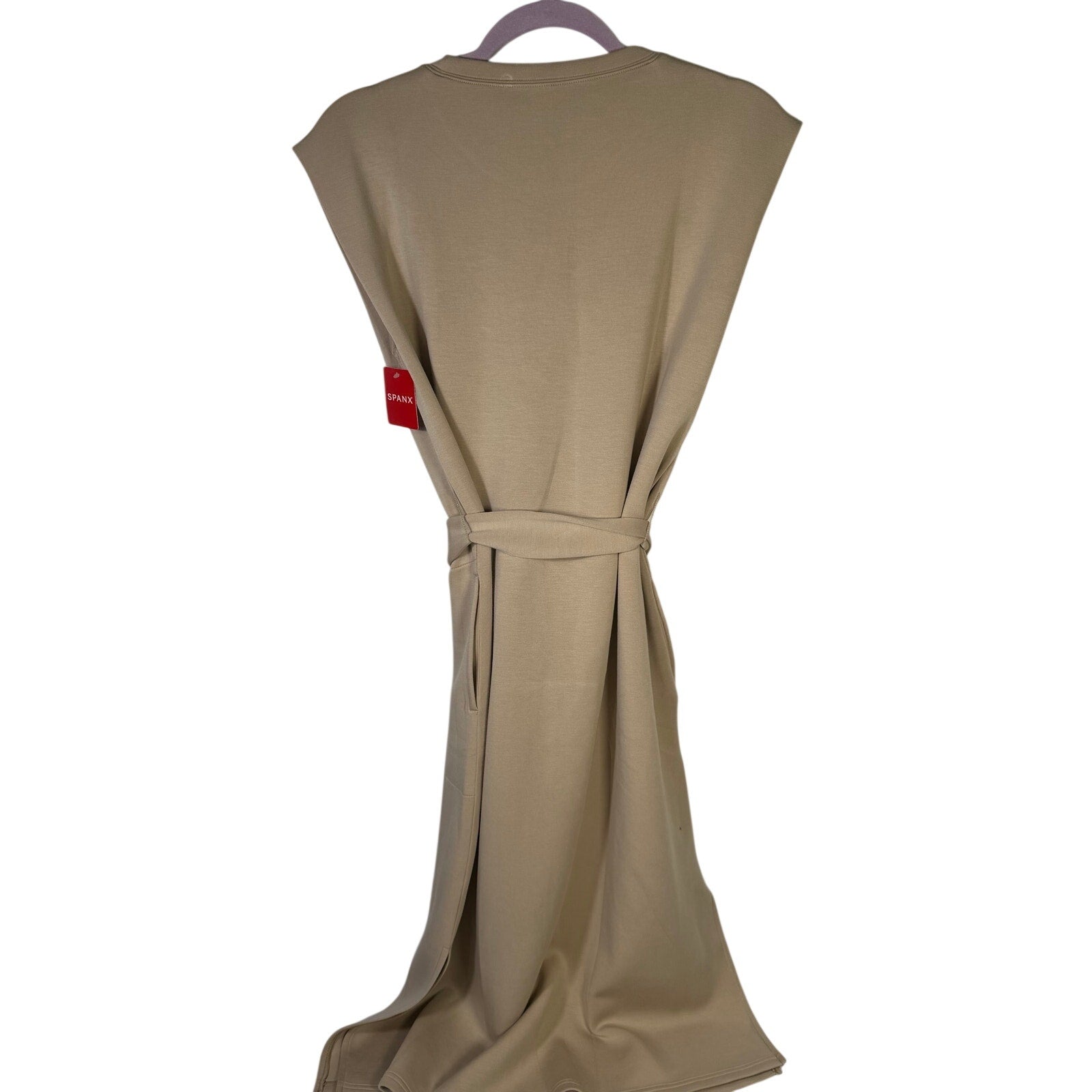 Spanx AirEssentials sleeveless tie-waist tank dress in Tahini, size large, featuring a relaxed fit and stylish design.